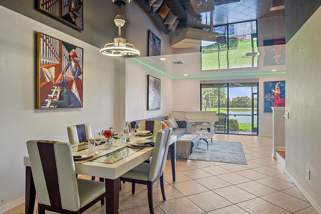 7325 Skybird Road, Unit 399 Bradenton, FL 34209 - Photo 12 of 49 a view of a dining room with furniture window and outside view