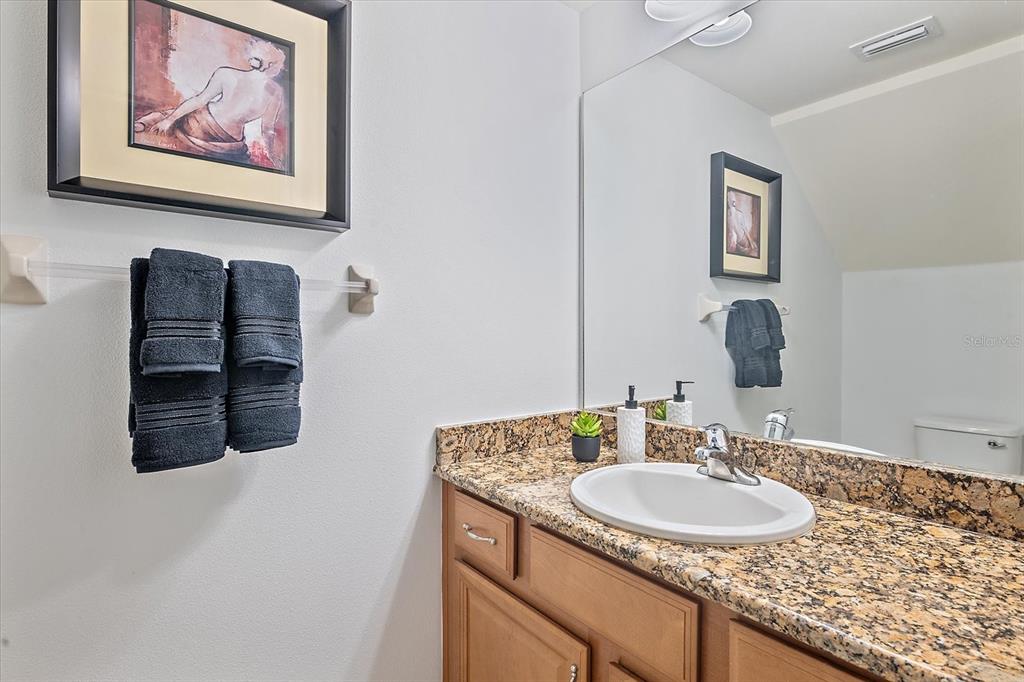 7325 Skybird Road, Unit 399 Bradenton, FL 34209 - Photo 16 of 49 a bathroom with a sink and a mirror