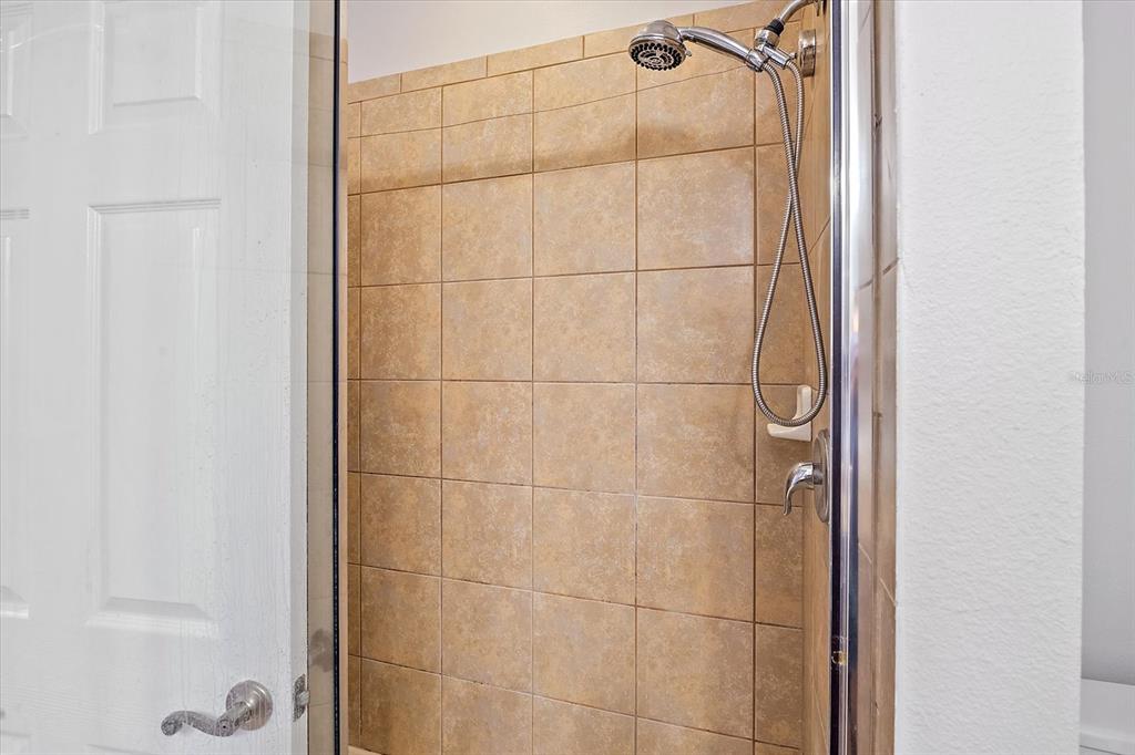 7325 Skybird Road, Unit 399 Bradenton, FL 34209 - Photo 18 of 49 a bathroom with a shower