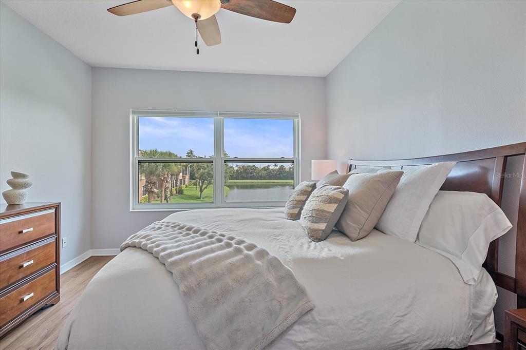 7325 Skybird Road, Unit 399 Bradenton, FL 34209 - Photo 23 of 49 a bedroom with a bed and a window