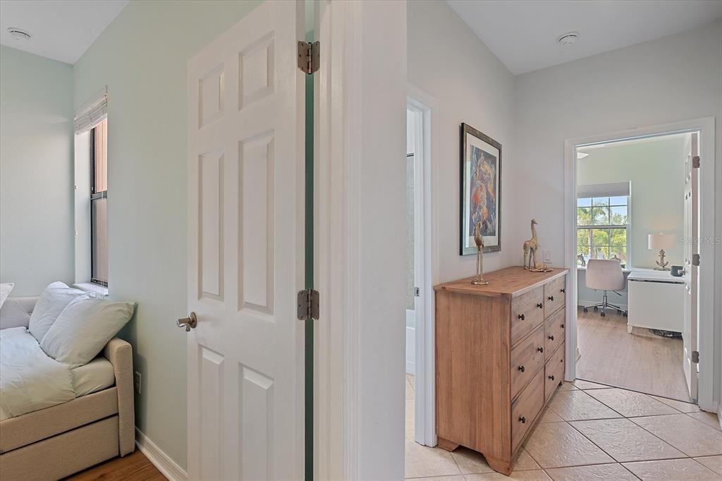 7325 Skybird Road, Unit 399 Bradenton, FL 34209 - Photo 27 of 49 a spacious bathroom with a double vanity sink and a mirror