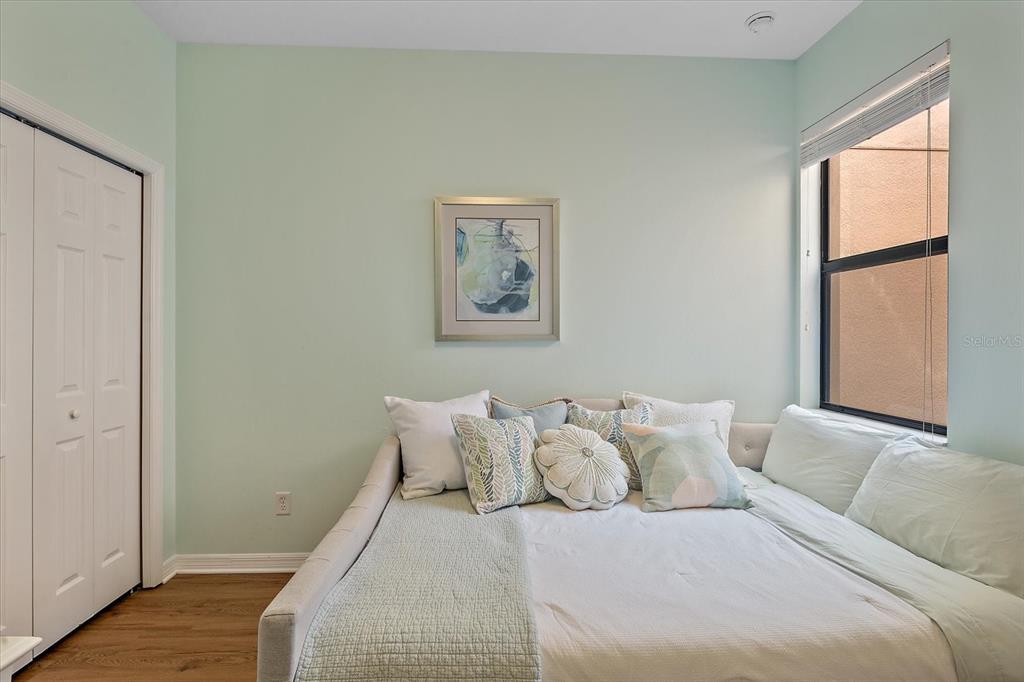 7325 Skybird Road, Unit 399 Bradenton, FL 34209 - Photo 29 of 49 a bedroom with a bed and a window