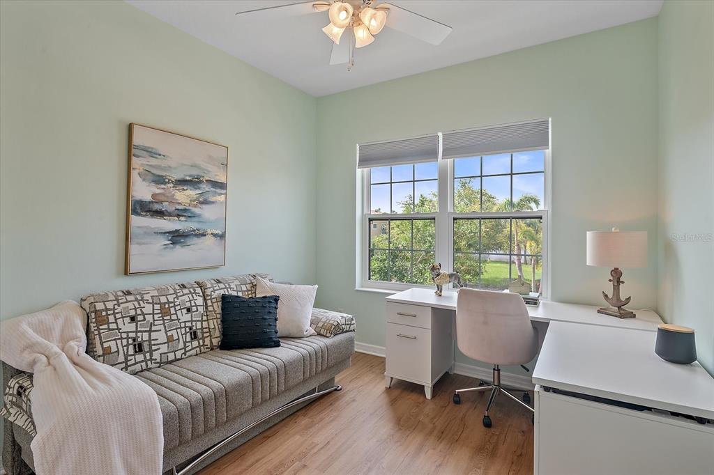 7325 Skybird Road, Unit 399 Bradenton, FL 34209 - Photo 33 of 49 a living room with furniture and a window