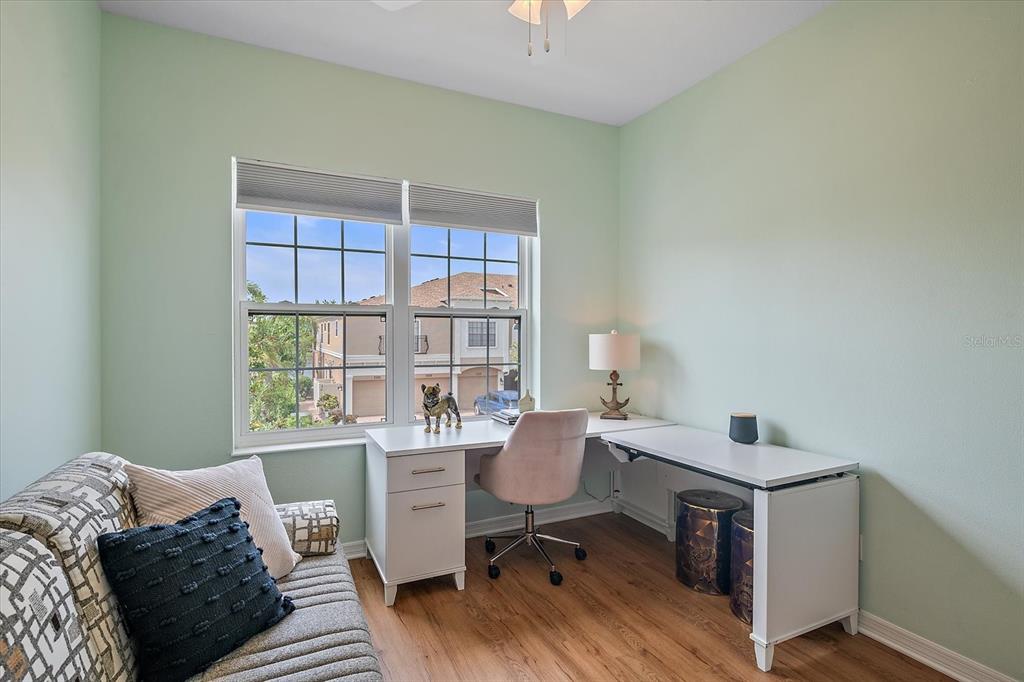 7325 Skybird Road, Unit 399 Bradenton, FL 34209 - Photo 34 of 49 a workspace with furniture and a window
