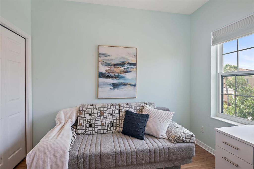 7325 Skybird Road, Unit 399 Bradenton, FL 34209 - Photo 36 of 49 a bedroom with a bed and window