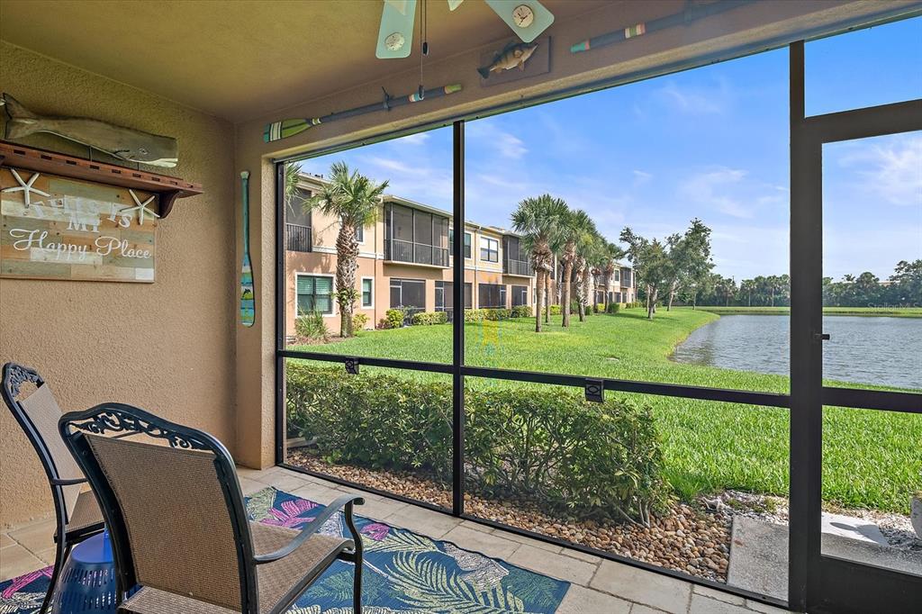 7325 Skybird Road, Unit 399 Bradenton, FL 34209 - Photo 39 of 49 a view of a porch with furniture and garden