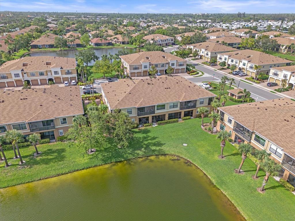 7325 Skybird Road, Unit 399 Bradenton, FL 34209 - Photo 43 of 49 an aerial view of a house with a big yard