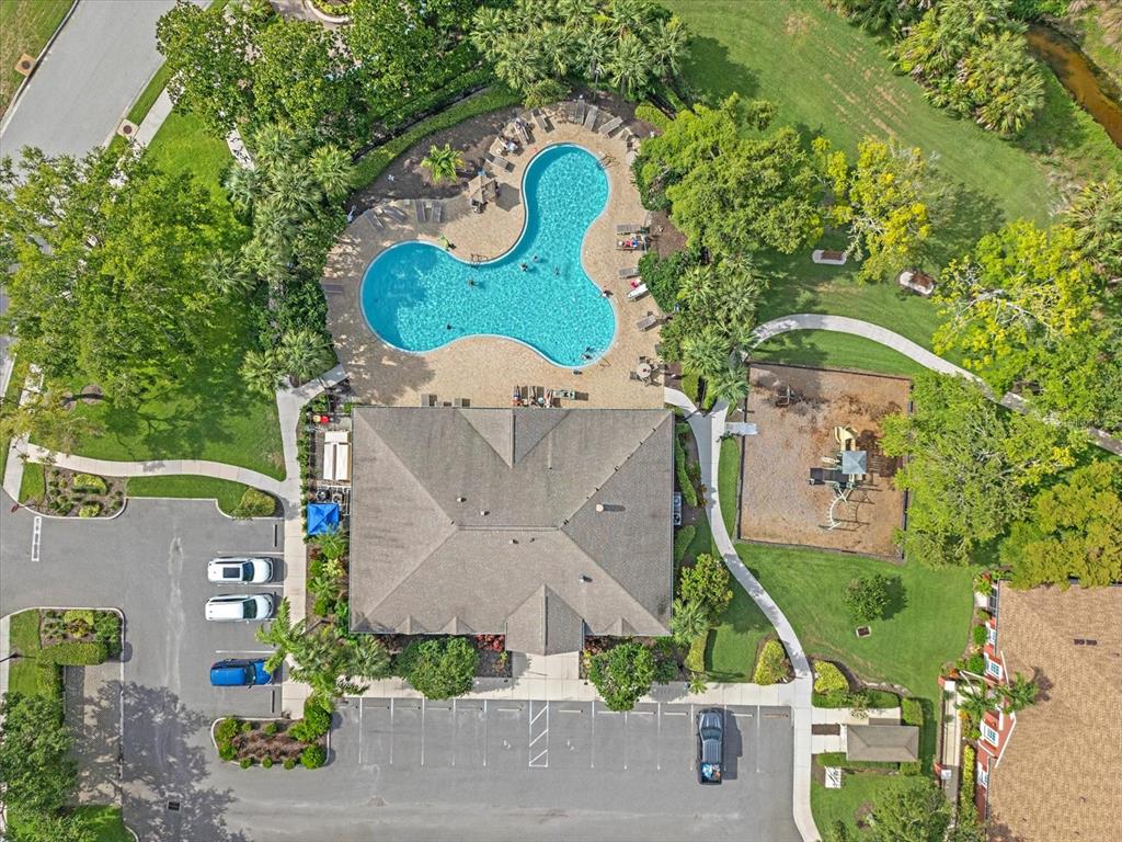 7325 Skybird Road, Unit 399 Bradenton, FL 34209 - Photo 46 of 49 an aerial view of a house with a garden and trees