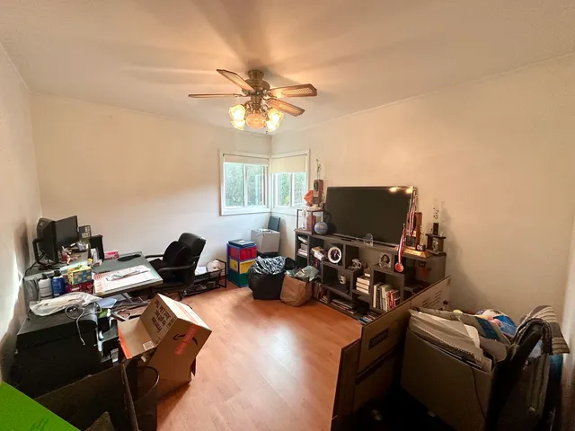 a room with furniture and a flat screen tv