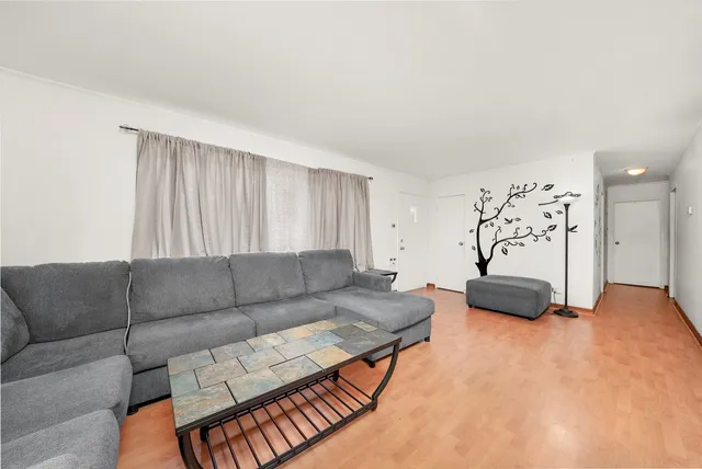 a living room with furniture and a couch