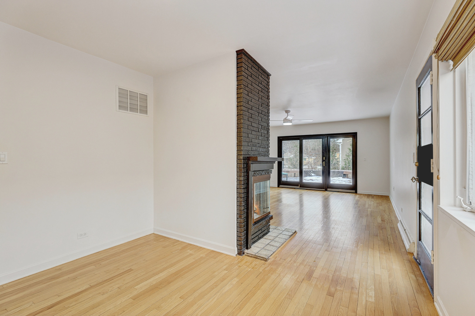 1343 Oxford Road Deerfield, IL 60015 - Photo 12 of 28 a view of hallway with wooden floor and stairs