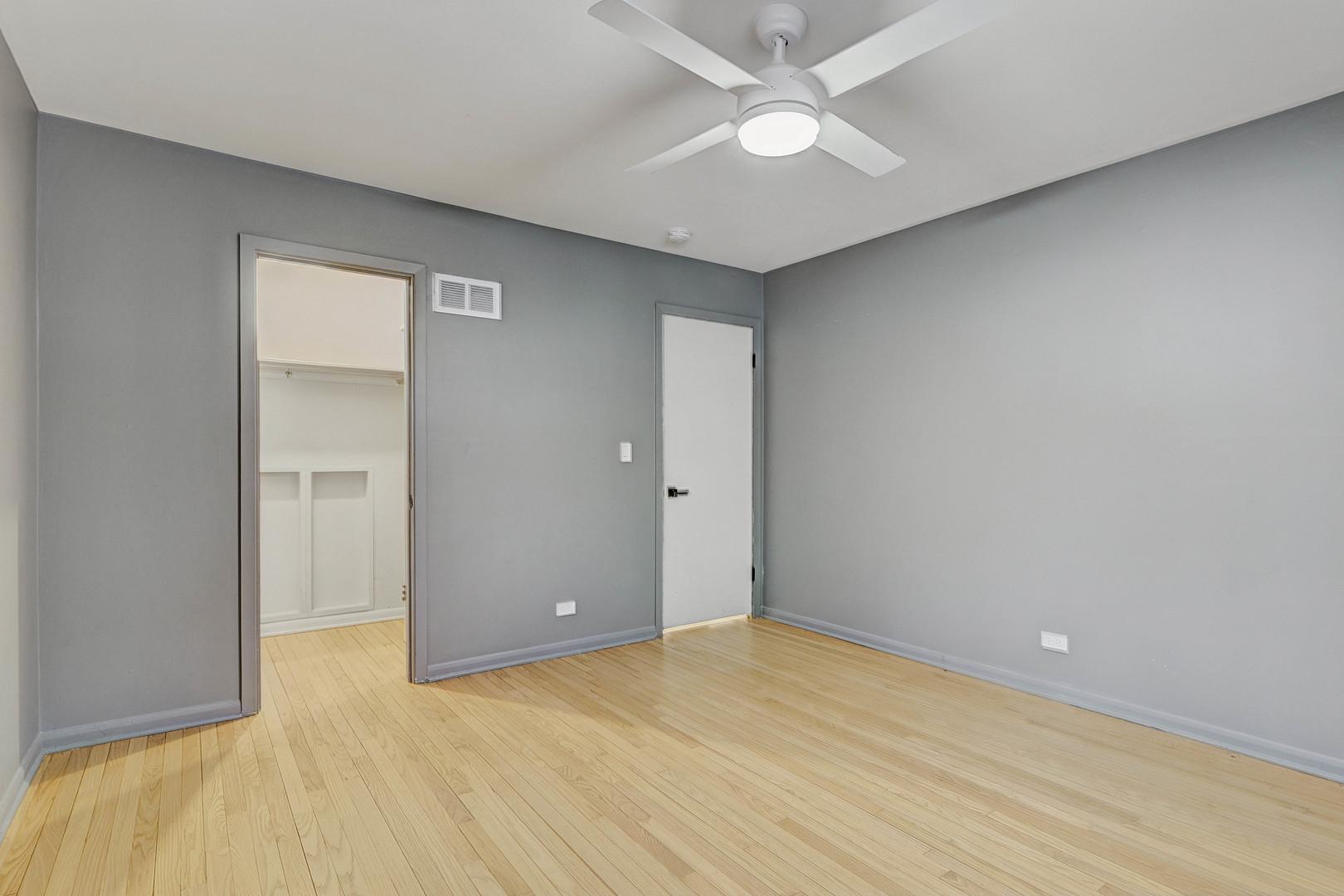 1343 Oxford Road Deerfield, IL 60015 - Photo 18 of 28 wooden floor in an empty room
