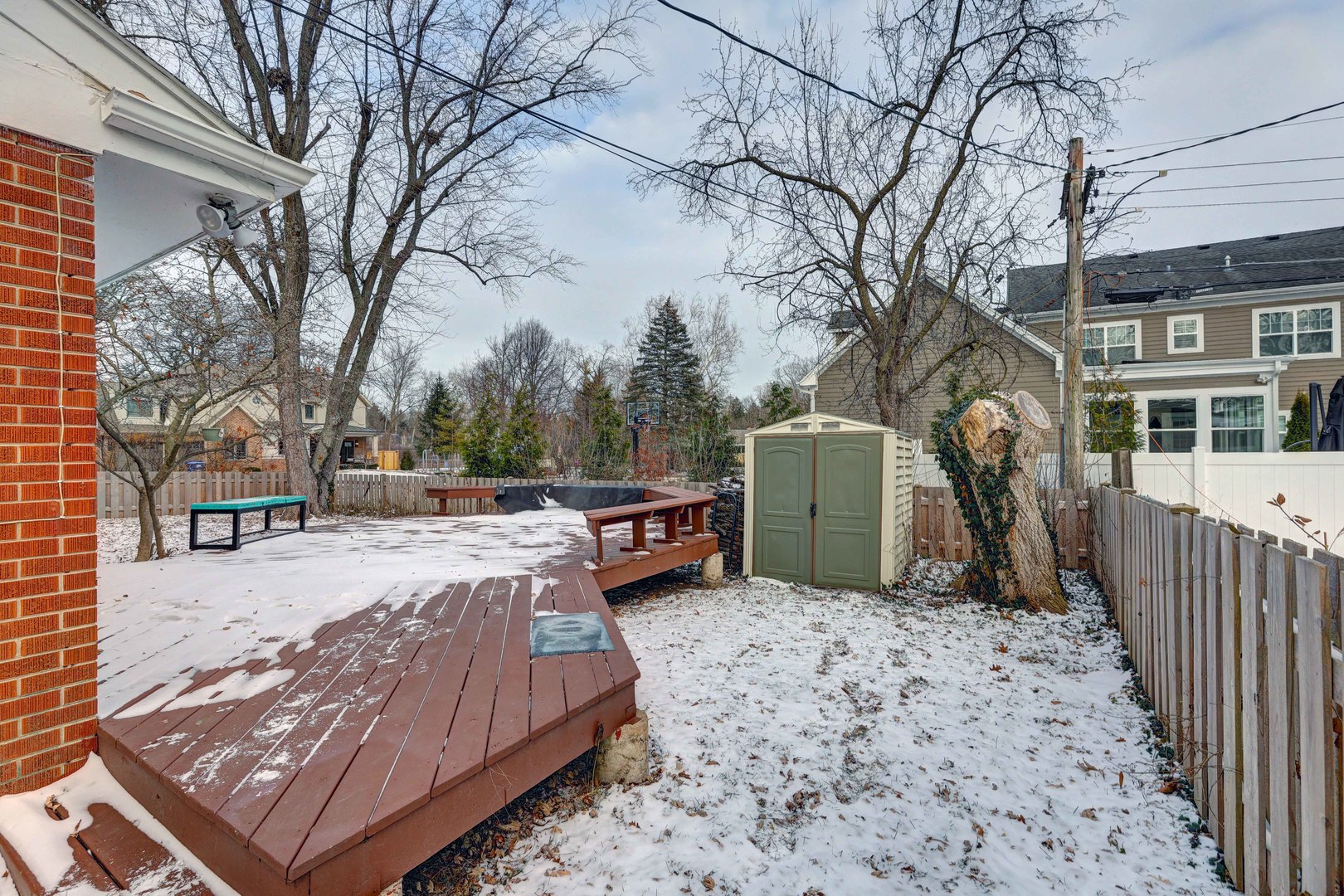 1343 Oxford Road Deerfield, IL 60015 - Photo 24 of 28 a view of a backyard with wooden fence