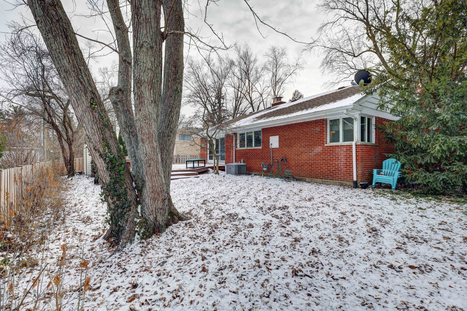 1343 Oxford Road Deerfield, IL 60015 - Photo 26 of 28 a front view of a house with garden