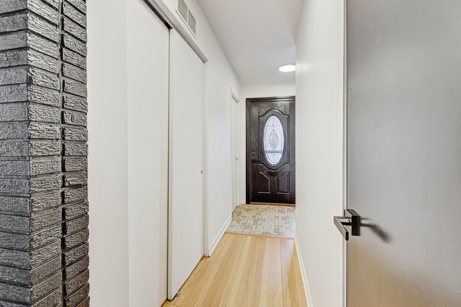 1343 Oxford Road Deerfield, IL 60015 - Photo 5 of 28 a view of a bathroom from a hallway