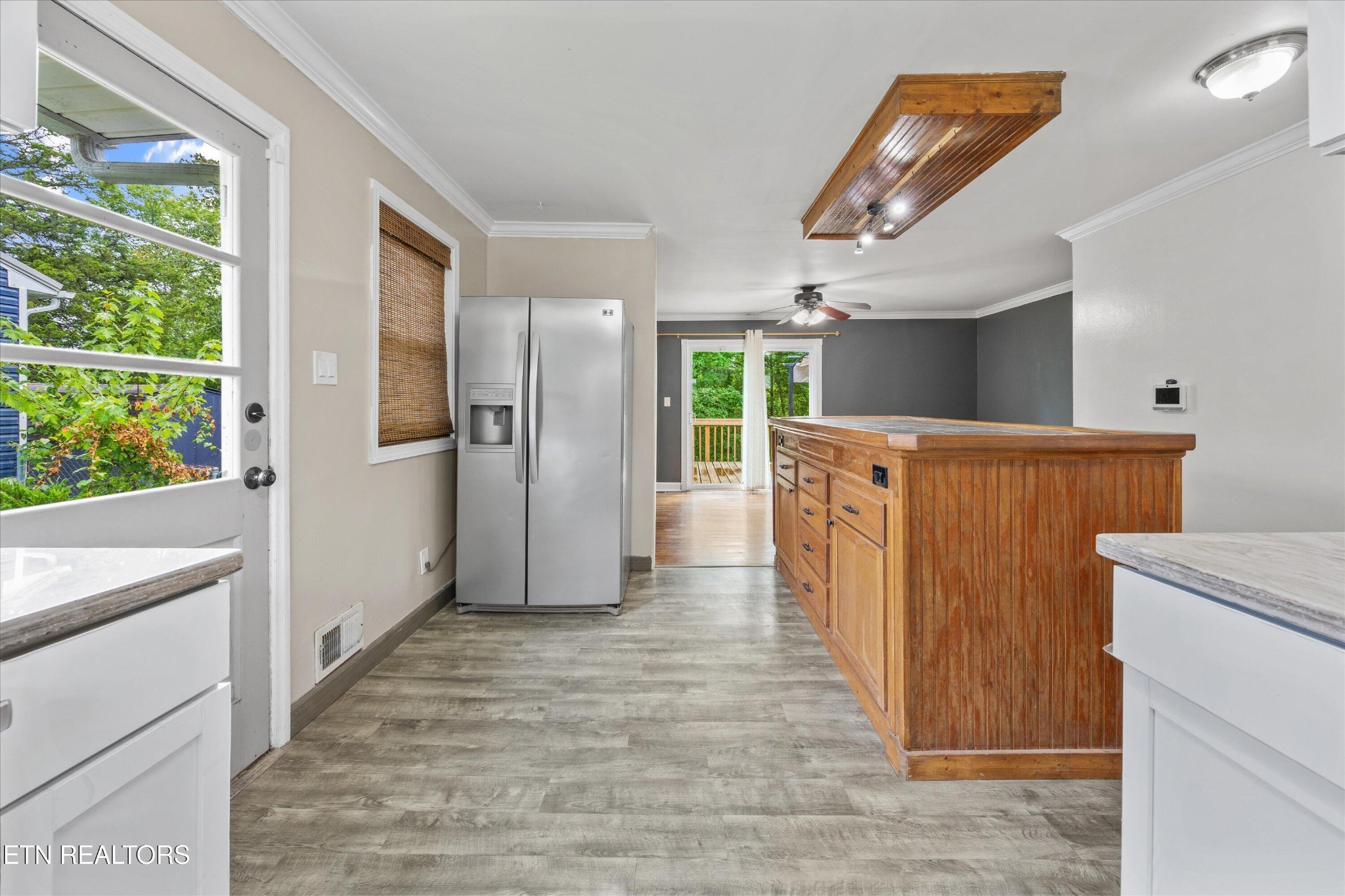 135 West Arrowwood Road Oak Ridge, TN 37830 - Photo 8 of 29 a view of a hallway with wooden floor and staircase