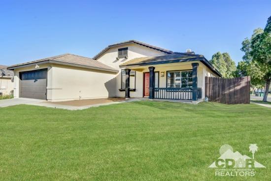 841 Homestead Road Corona, CA 92878 - Photo 1 of 21 a front view of a house with a garden
