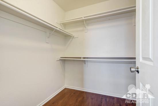 841 Homestead Road Corona, CA 92878 - Photo 13 of 21 a view of a room with wooden floor