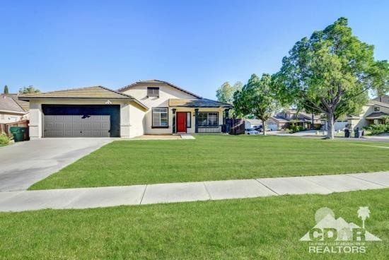 841 Homestead Road Corona, CA 92878 - Photo 3 of 21 a front view of a house with a yard