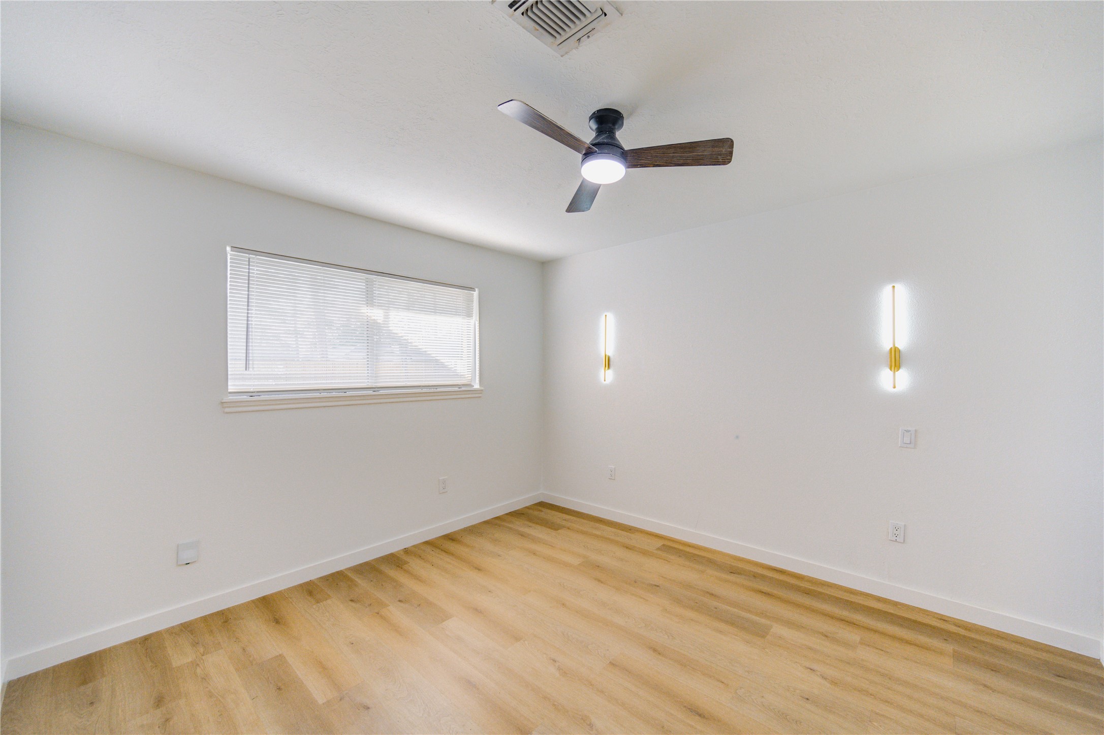 25607 Spring Ridge Drive Spring, TX 77386 - Photo 27 of 50 a view of empty room with wooden floor