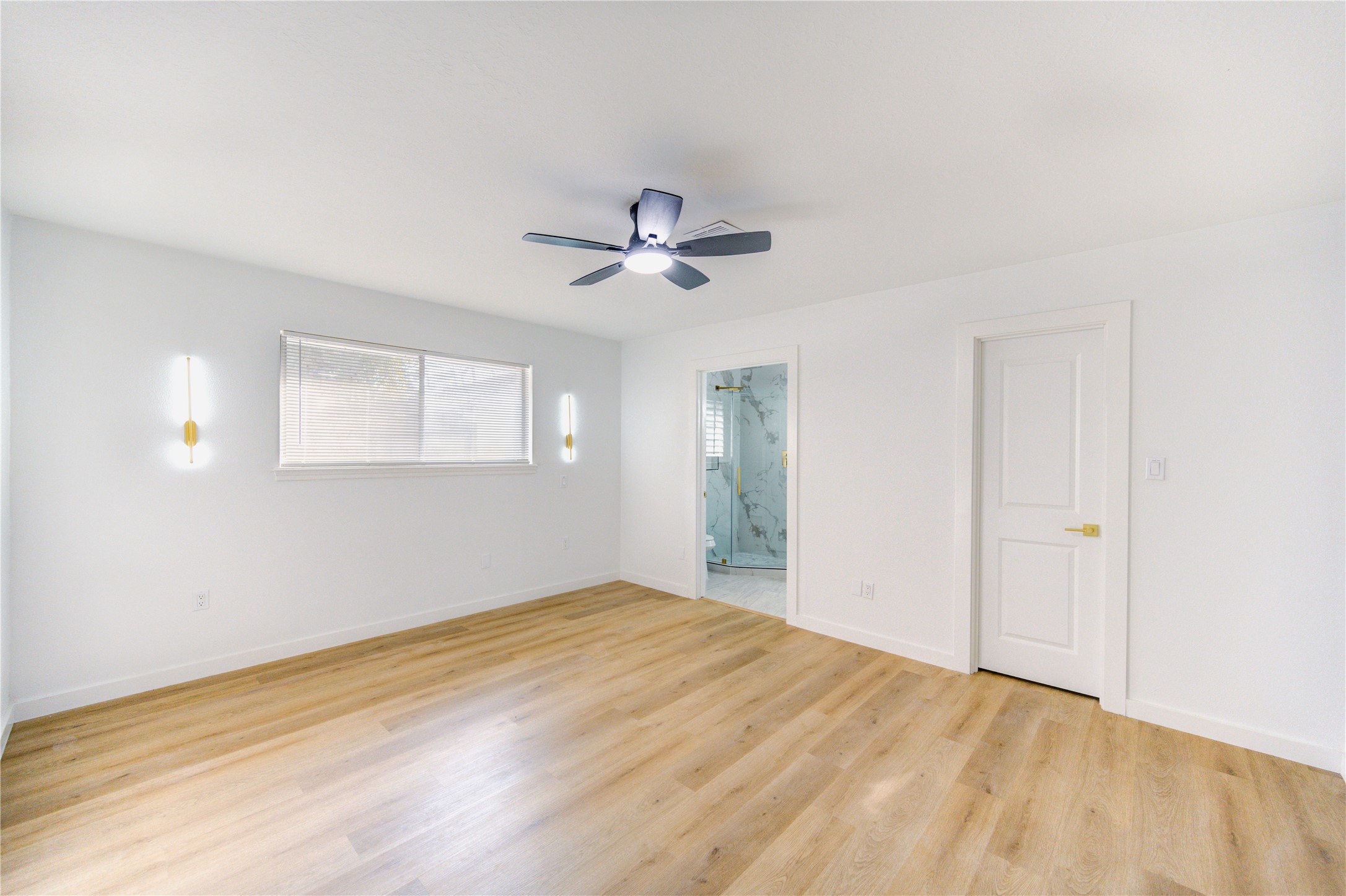 25607 Spring Ridge Drive Spring, TX 77386 - Photo 30 of 50 Master bedroom with celing fan, installed nightstand lighting for added style and functionality