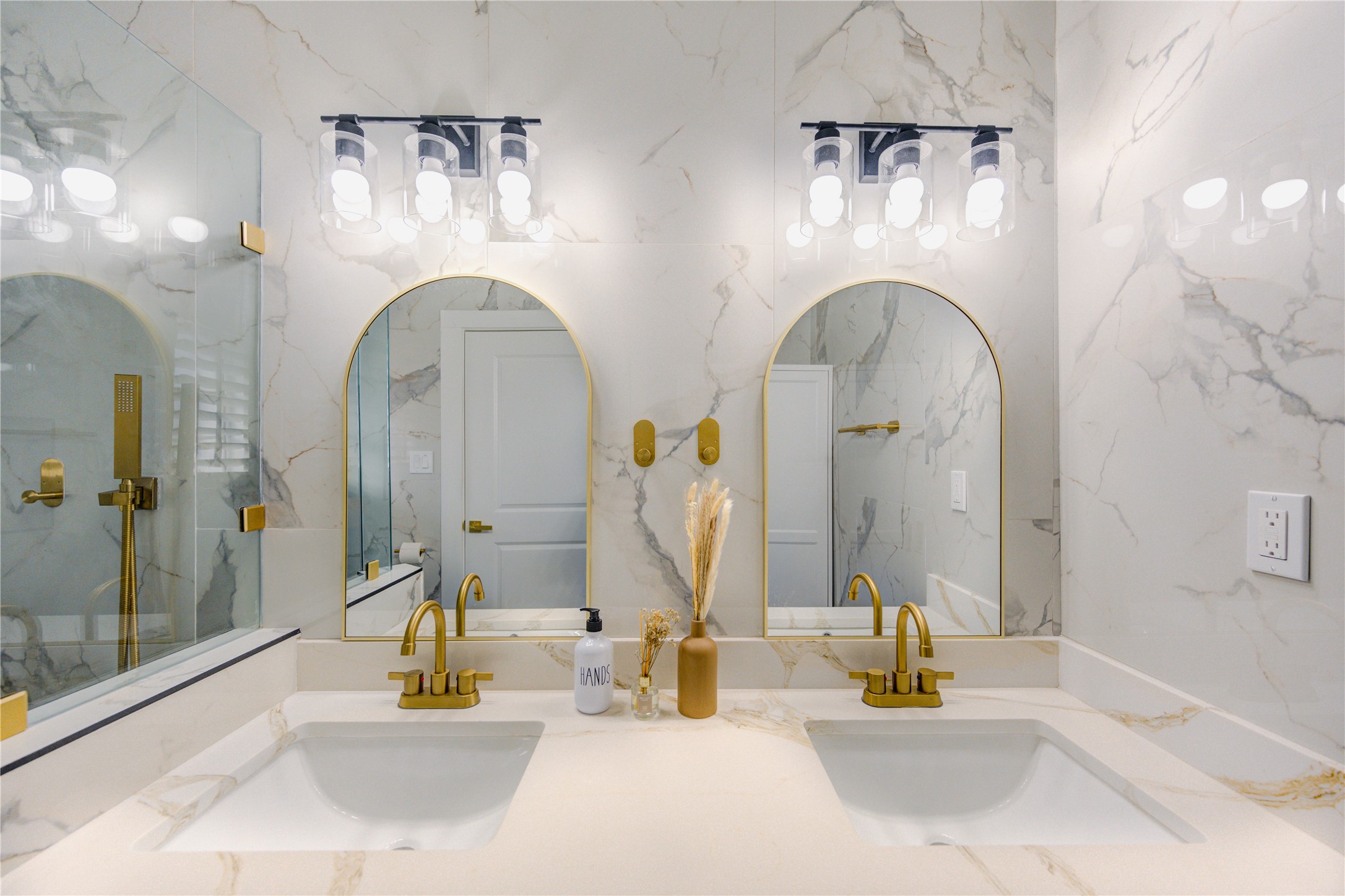 25607 Spring Ridge Drive Spring, TX 77386 - Photo 35 of 50 Master bathrooms with floor to ceiling tiles, standing shower with elegant fixtures, double-sink vanity, and ADA accessible door