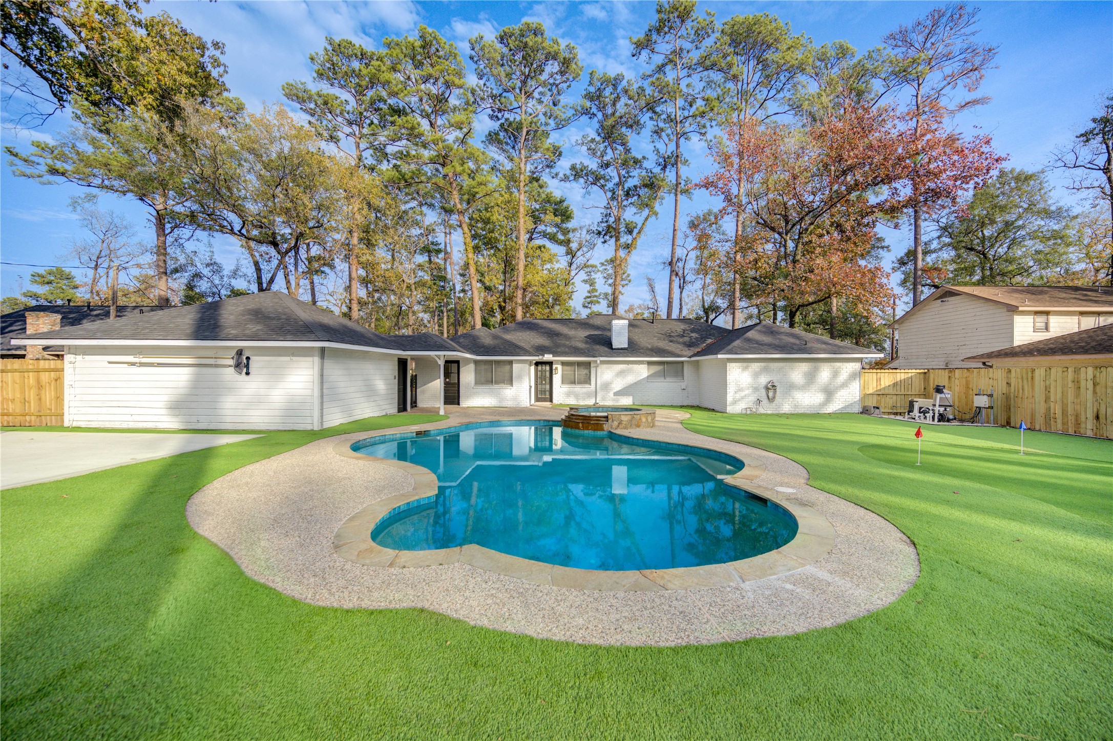 25607 Spring Ridge Drive Spring, TX 77386 - Photo 38 of 50 a view of pool with outdoor seating