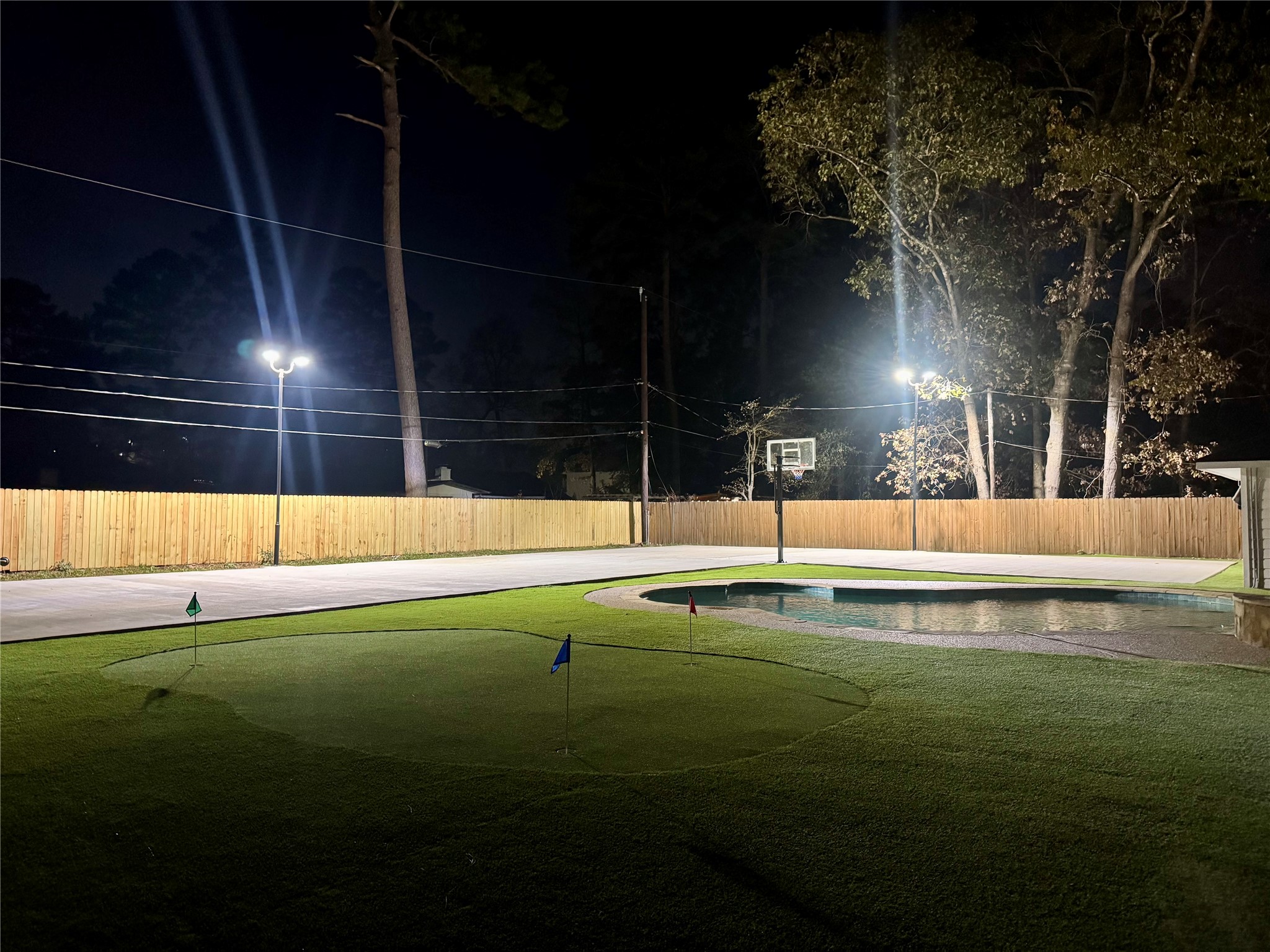 25607 Spring Ridge Drive Spring, TX 77386 - Photo 47 of 50 a swimming pool with an outdoor space and seating