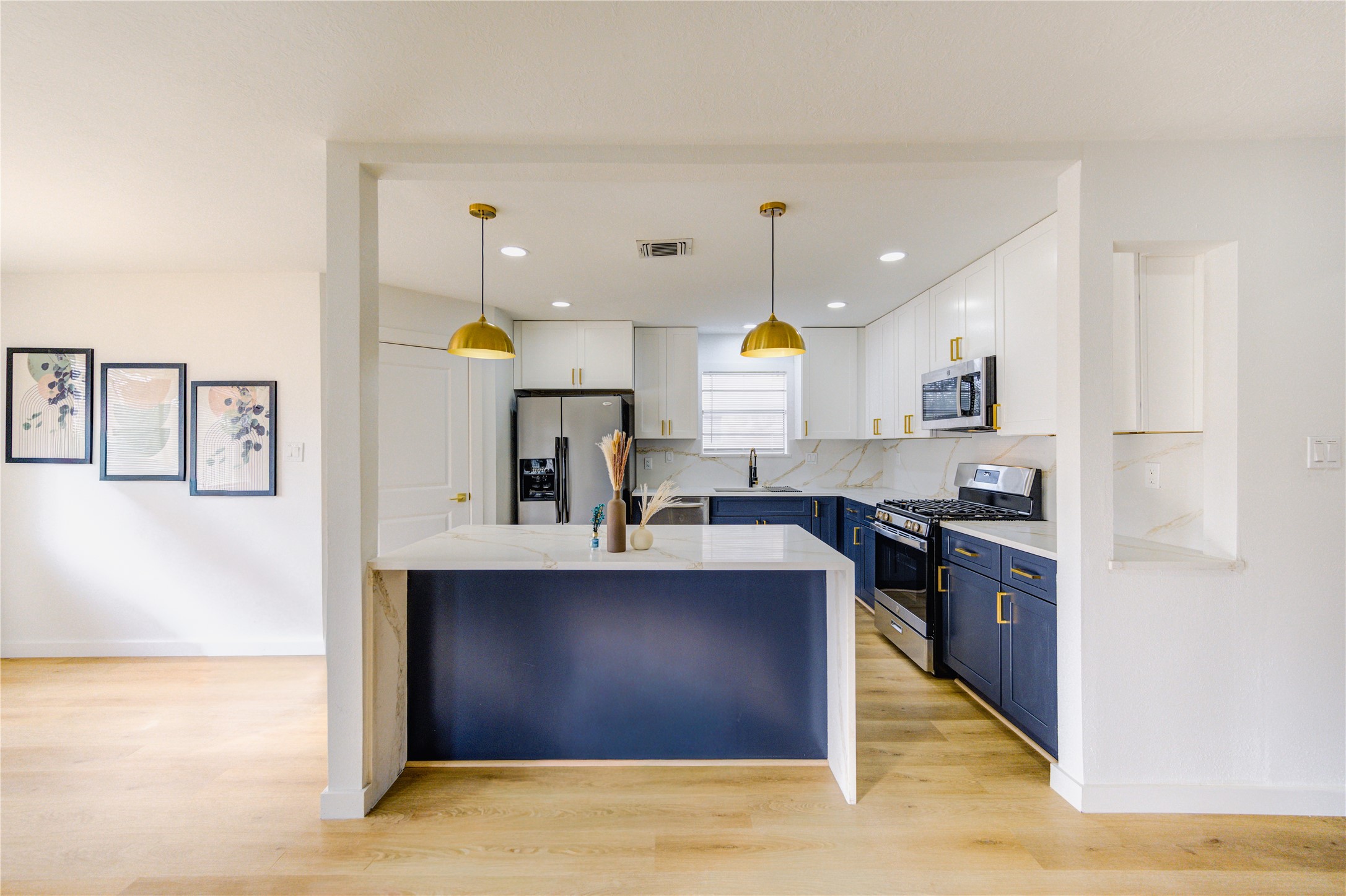25607 Spring Ridge Drive Spring, TX 77386 - Photo 10 of 50 Brand-new kitchen with quartz countertops, stainless appliances, and modern cabinetry