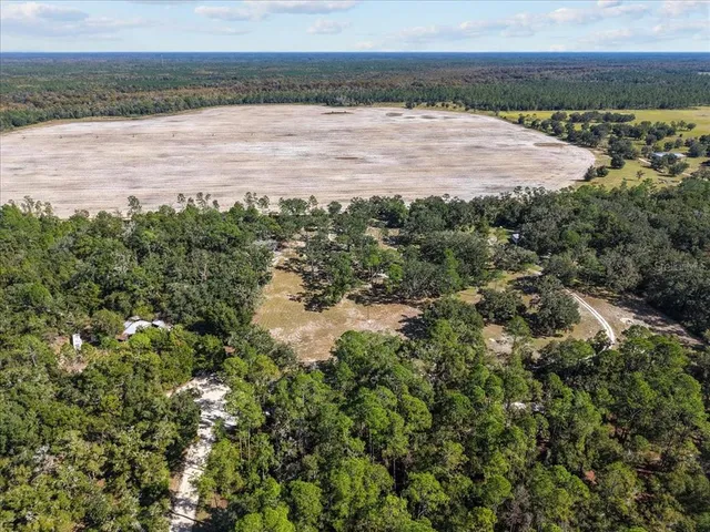 a view of a pathway with a lake view