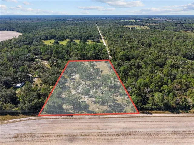 a view of a lake from a yard