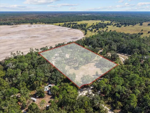 a view of a lake from a yard