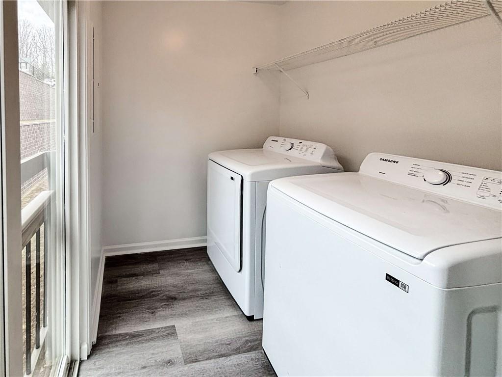 1400 Stonehaven Circle, Unit 1406 Cartersville, GA 30121 - Photo 20 of 21 a utility room with dryer and washer