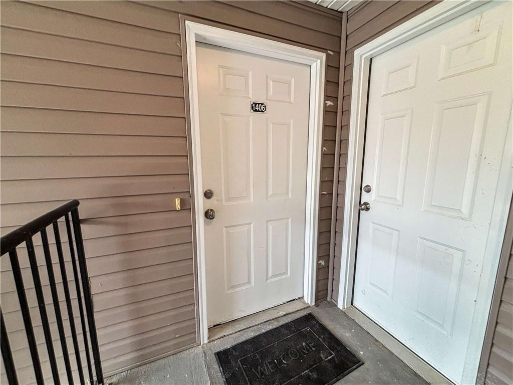 1400 Stonehaven Circle, Unit 1406 Cartersville, GA 30121 - Photo 2 of 21 a view of a door and a window