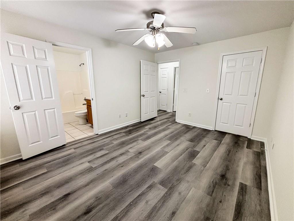 1400 Stonehaven Circle, Unit 1406 Cartersville, GA 30121 - Photo 10 of 21 a view of an empty room with a window