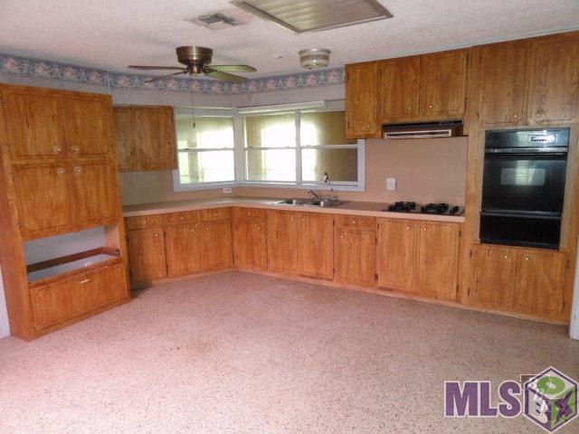 114 St Louis Street Raceland, LA 70394 - Photo 2 of 8 Kitchen 1
