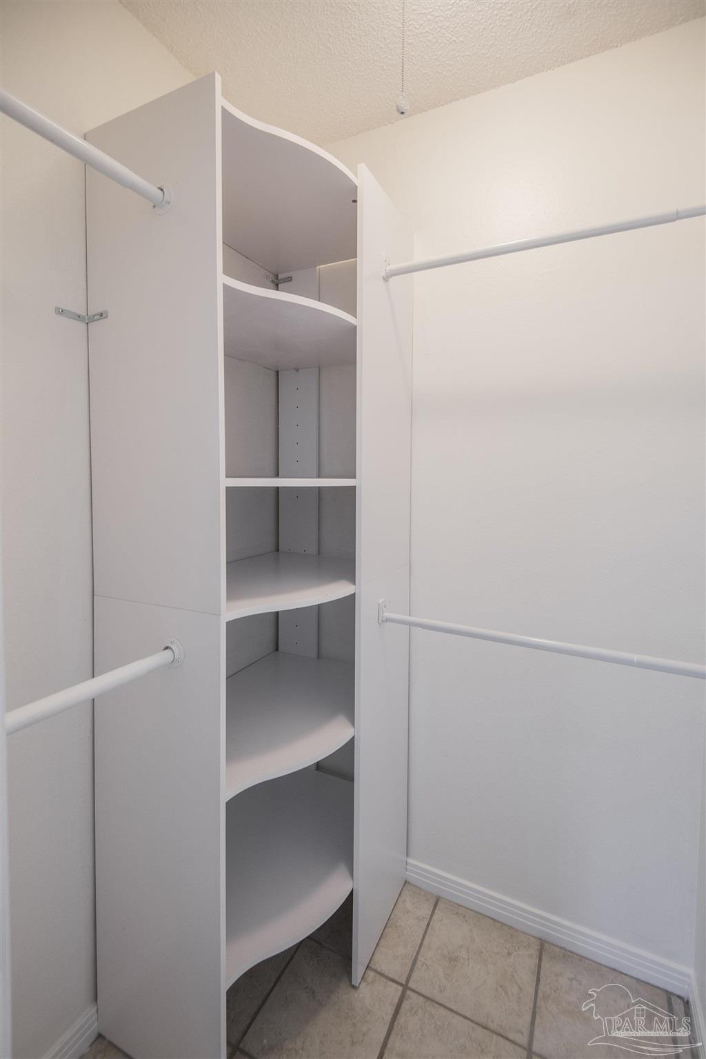 5578 Cyanamid Road Milton, FL 32583 - Photo 17 of 33 a view of an empty walk in closet