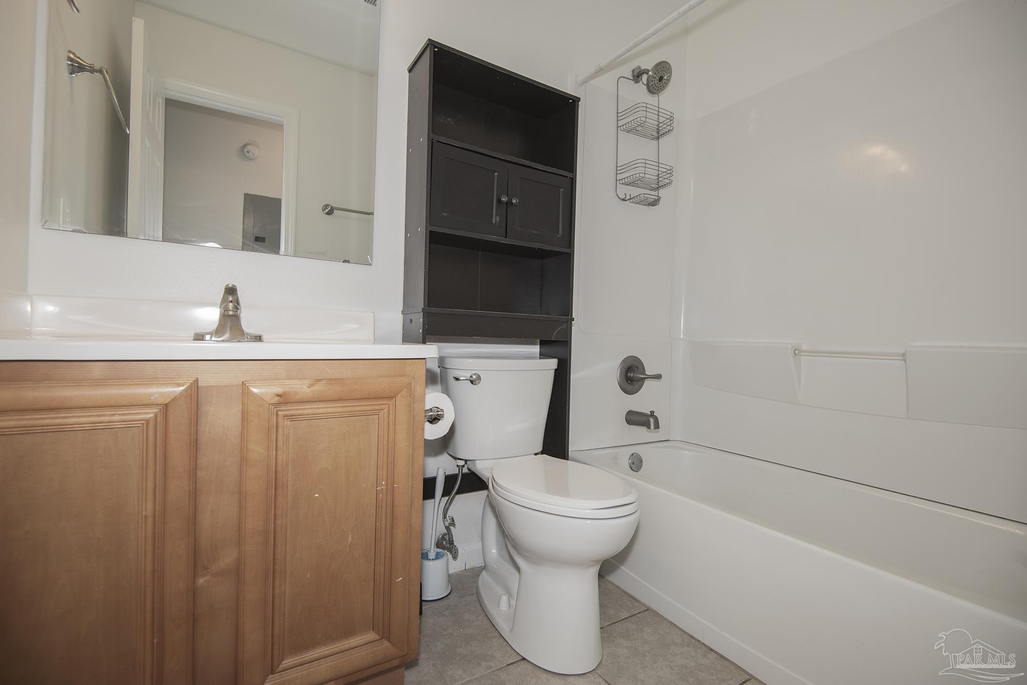 5578 Cyanamid Road Milton, FL 32583 - Photo 18 of 33 a bathroom with a sink toilet and shower