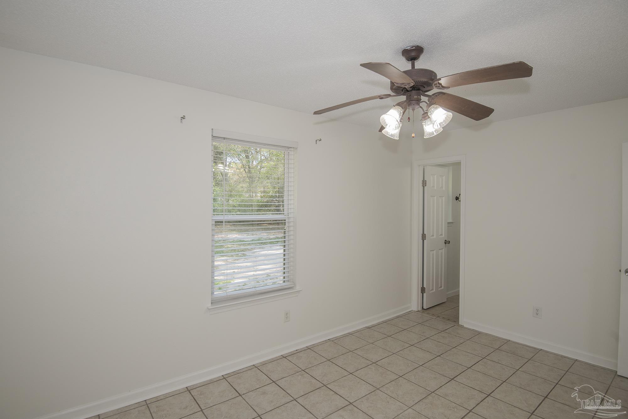 5578 Cyanamid Road Milton, FL 32583 - Photo 23 of 33 a view of an empty room with a window