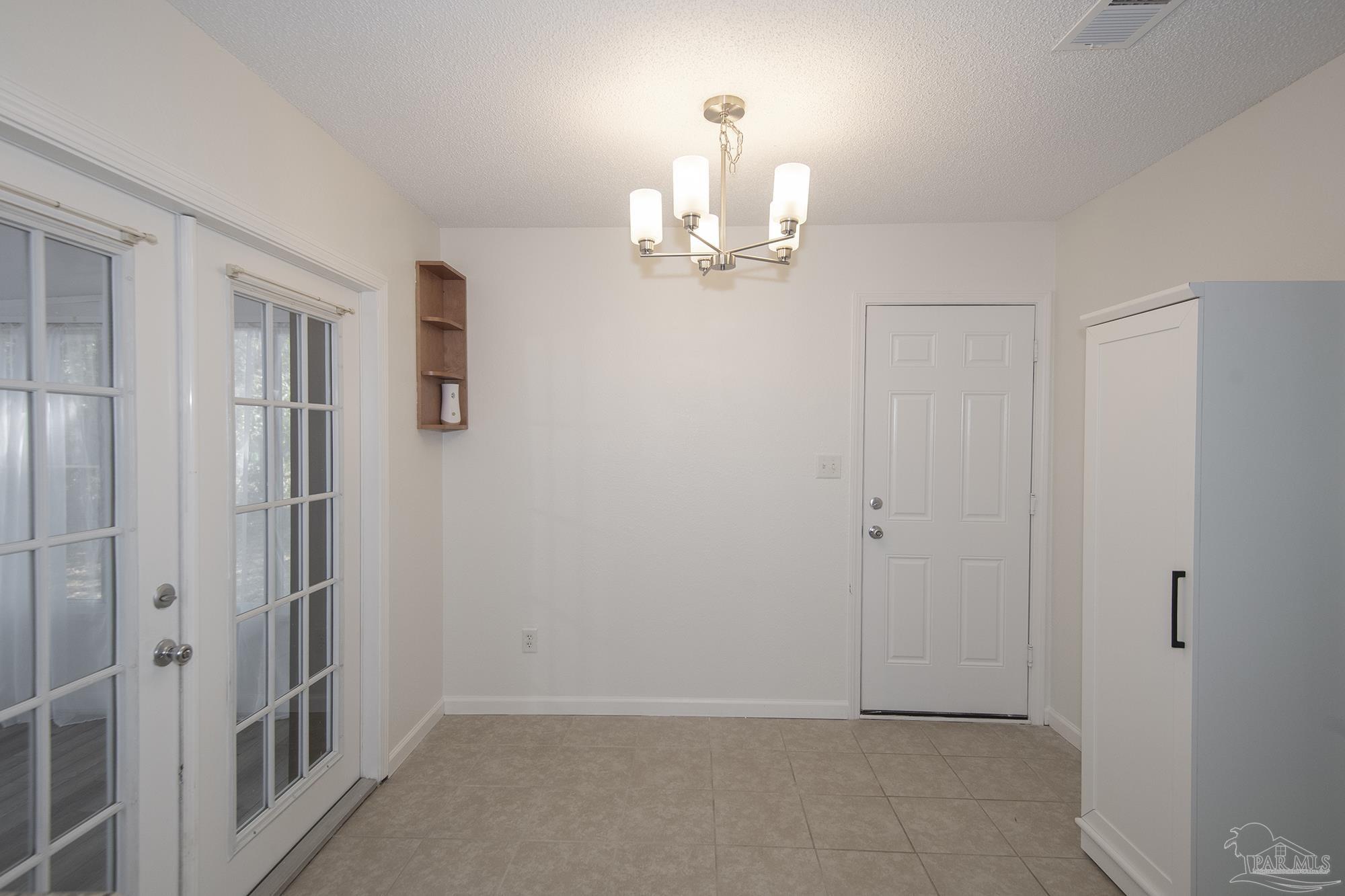 5578 Cyanamid Road Milton, FL 32583 - Photo 26 of 33 a view of empty room with a fireplace