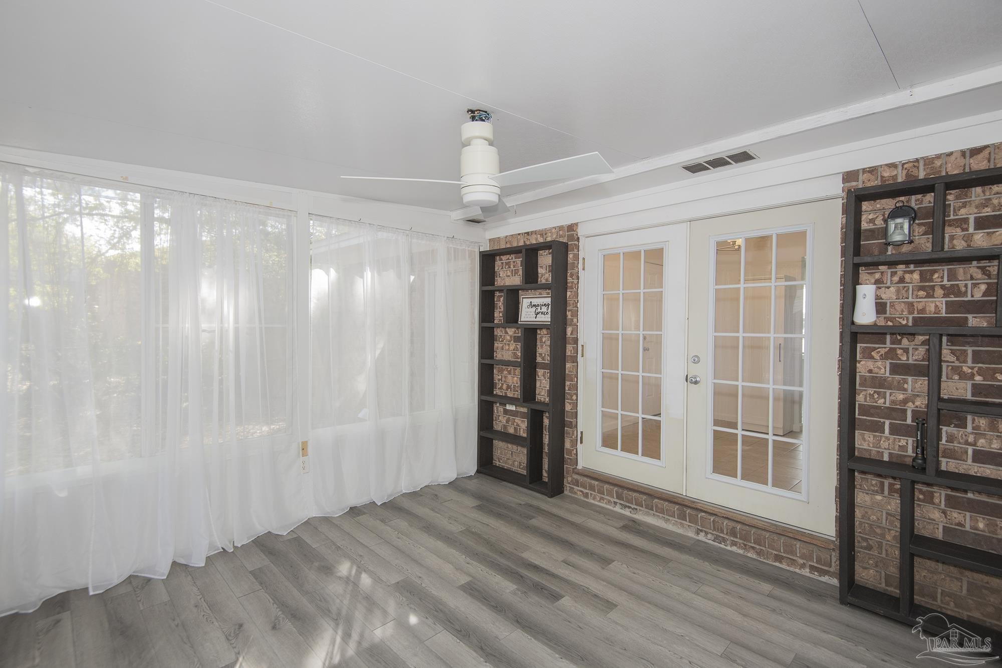 5578 Cyanamid Road Milton, FL 32583 - Photo 27 of 33 a view of an empty room with cabinet and a window
