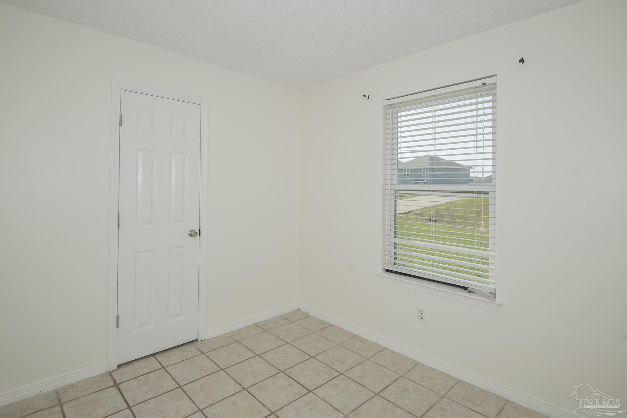 5578 Cyanamid Road Milton, FL 32583 - Photo 32 of 33 a view of an empty room with window