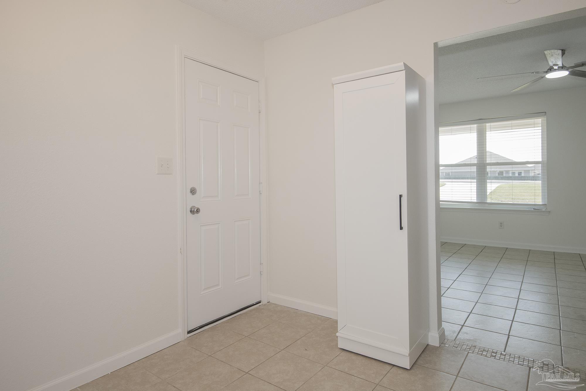 5578 Cyanamid Road Milton, FL 32583 - Photo 5 of 33 an empty room with windows