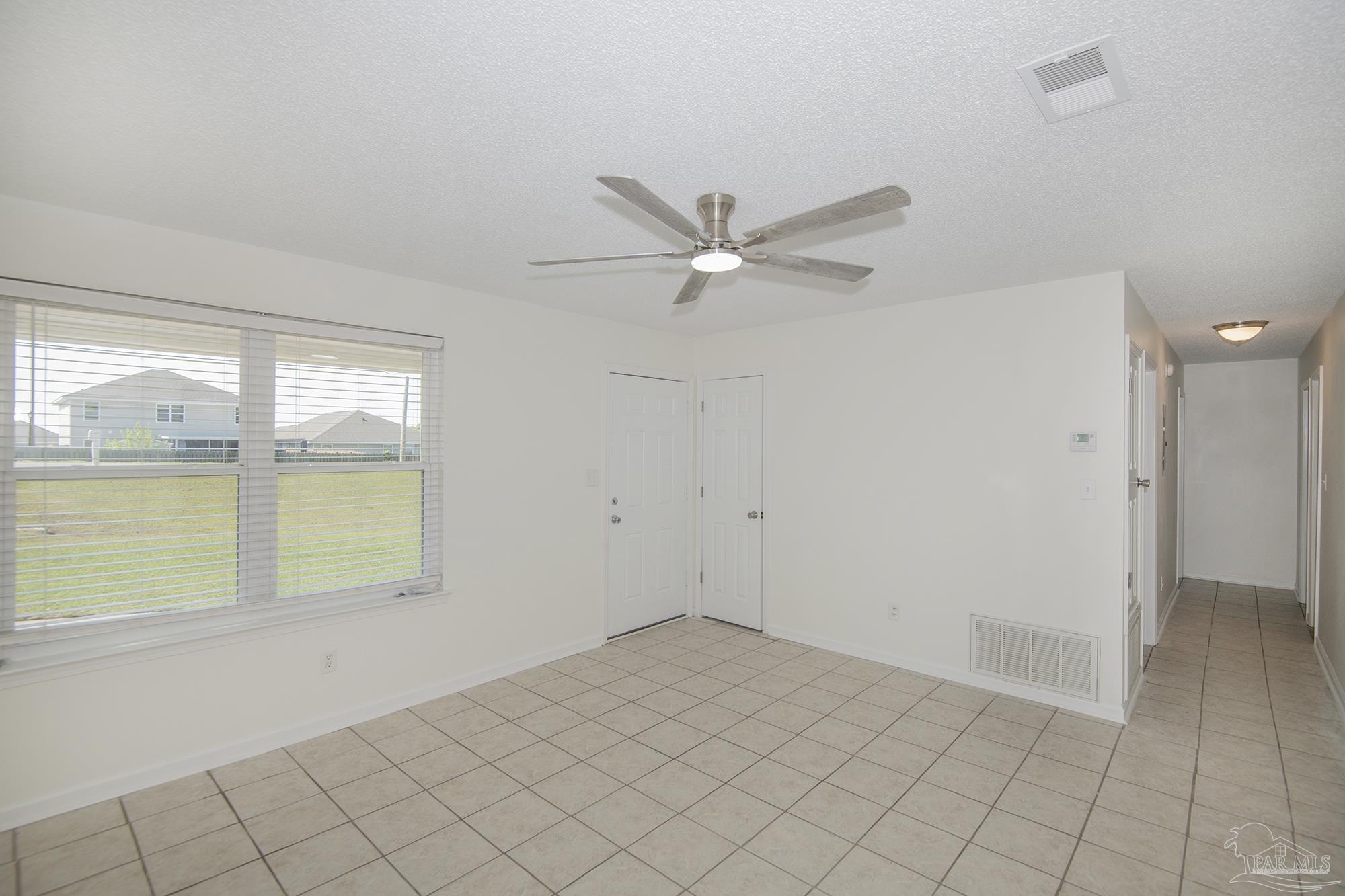 5578 Cyanamid Road Milton, FL 32583 - Photo 7 of 33 a view of an empty room and window