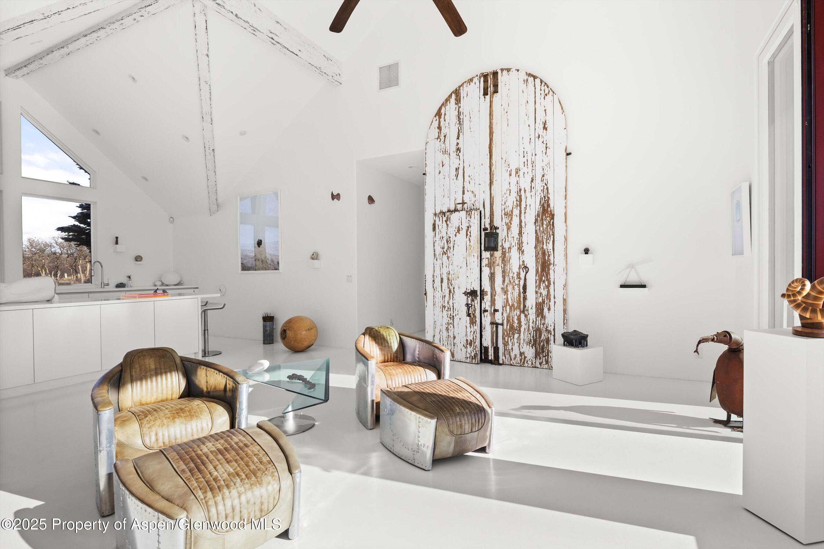 2103 Ten Peaks Mesa Road Carbondale, CO 81623 - Photo 13 of 52 a bathroom with a tub sink and mirror