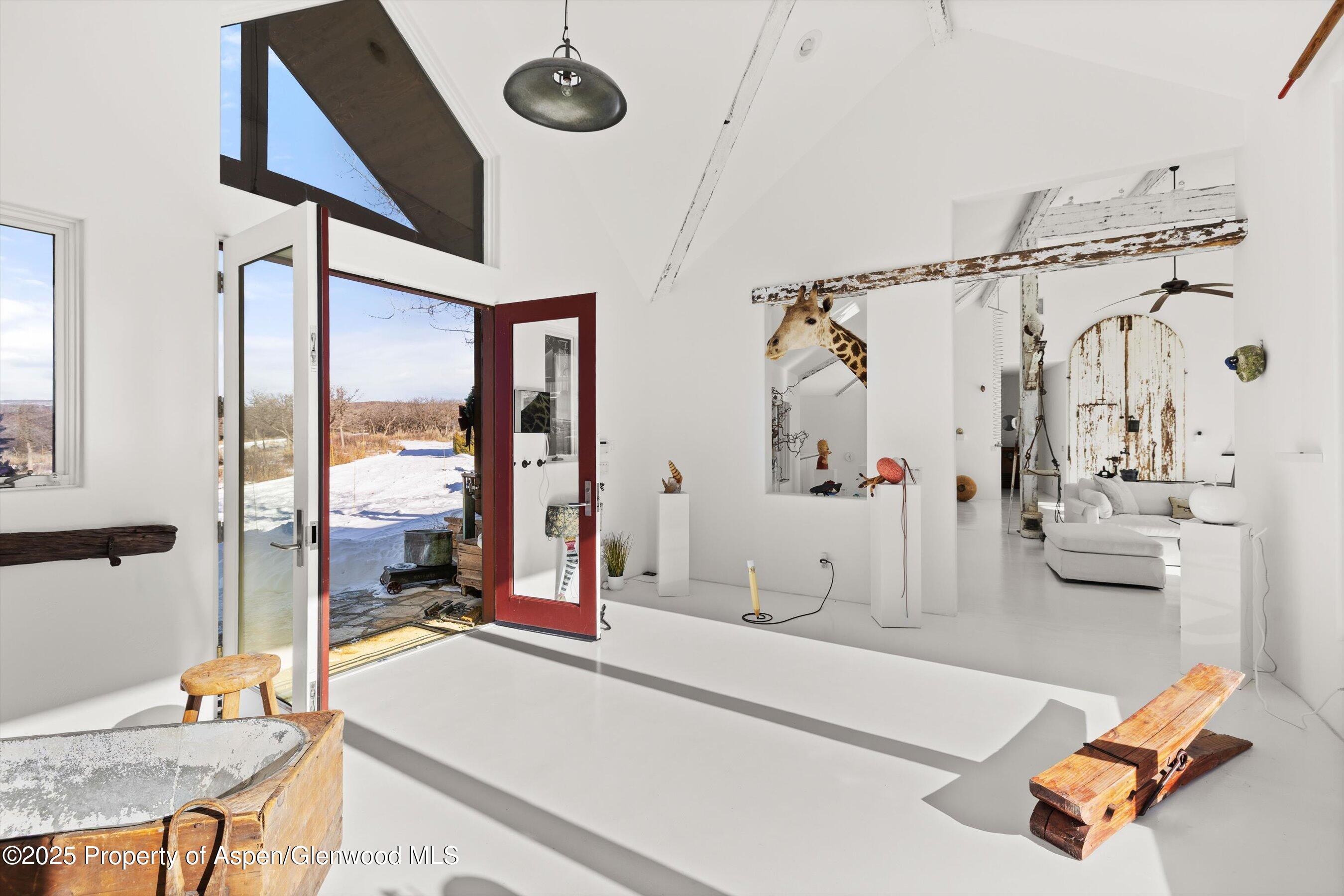 2103 Ten Peaks Mesa Road Carbondale, CO 81623 - Photo 38 of 52 a very nice looking room with a couch