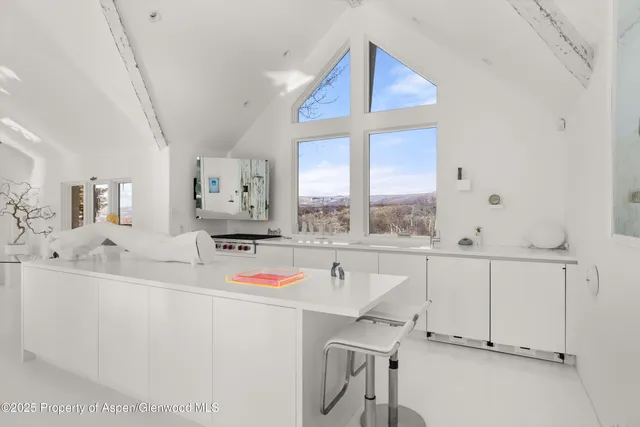 a very nice looking room with a large window