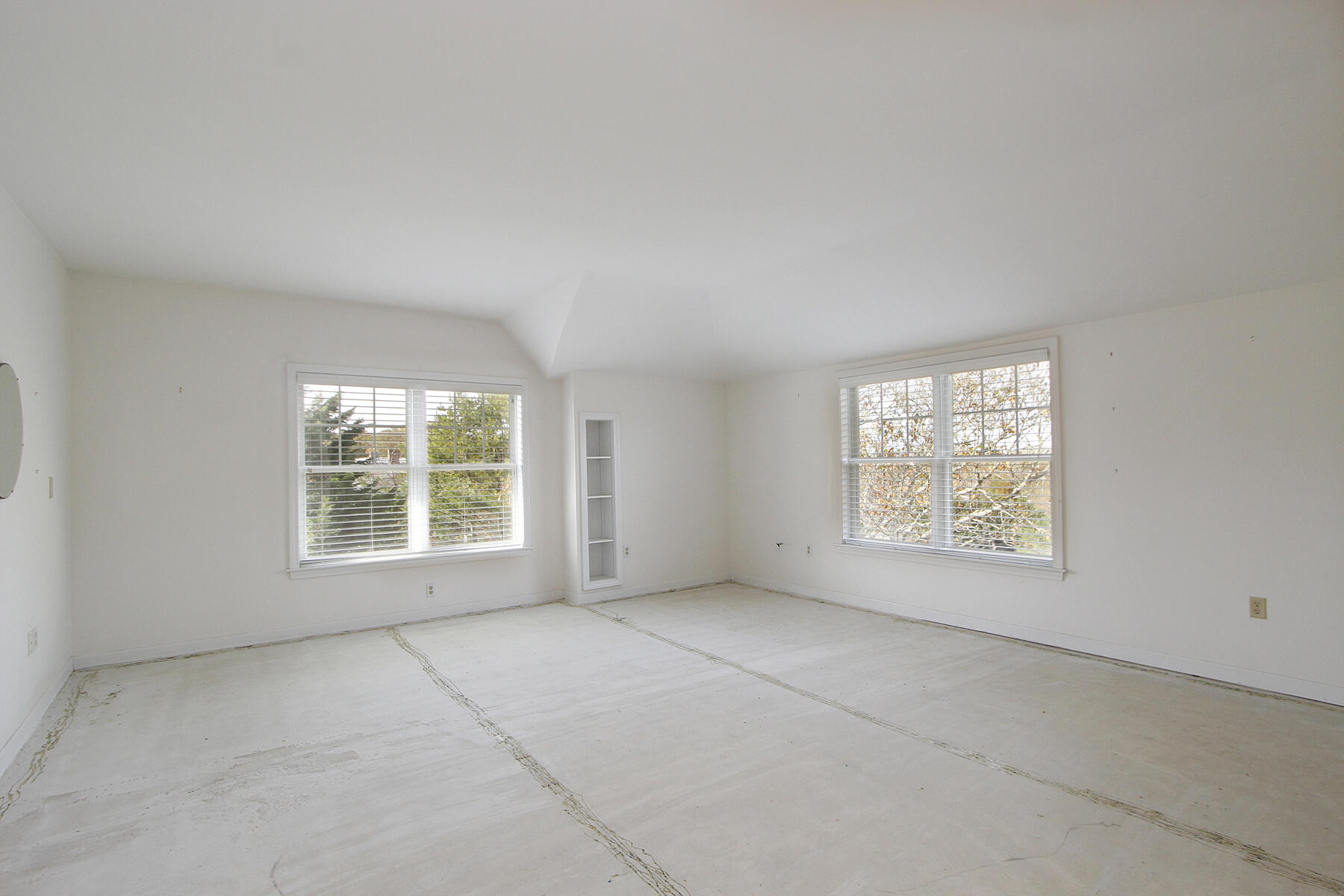 18 West Road, Unit 307 Orleans, MA 02653 - Photo 12 of 31 an empty room with a window
