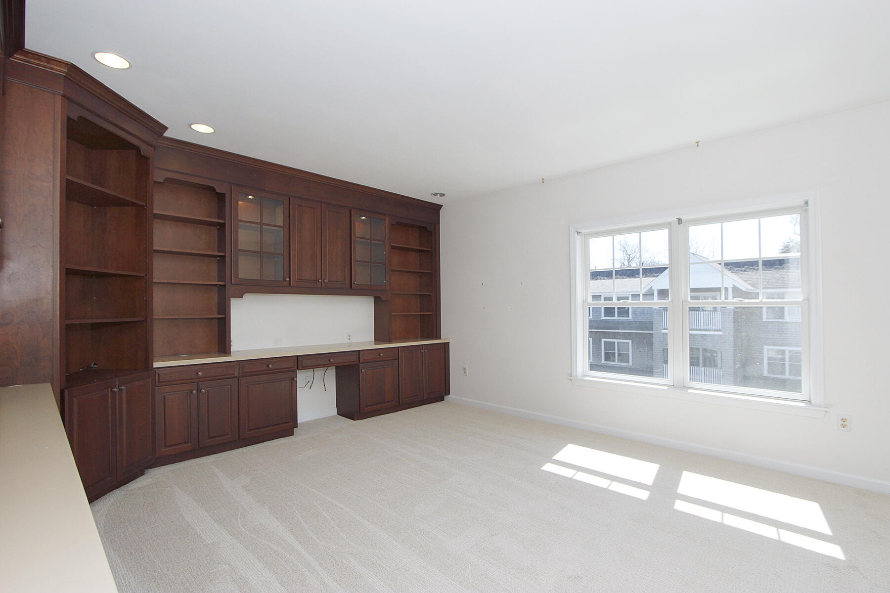 18 West Road, Unit 307 Orleans, MA 02653 - Photo 12 of 35 a room with furniture and window