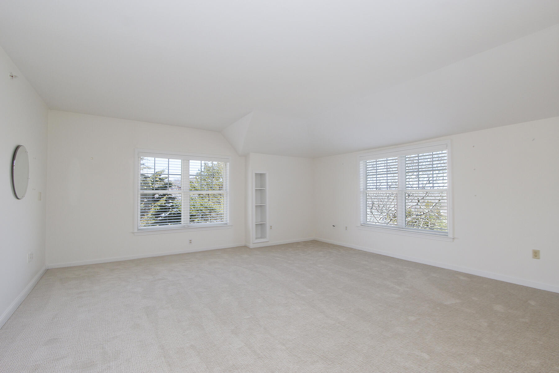 18 West Road, Unit 307 Orleans, MA 02653 - Photo 16 of 35 an empty room with windows